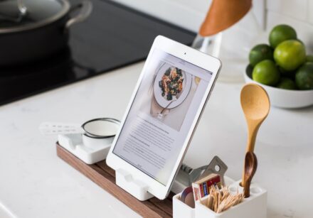 kitchen utensils and ipad showing a recipe